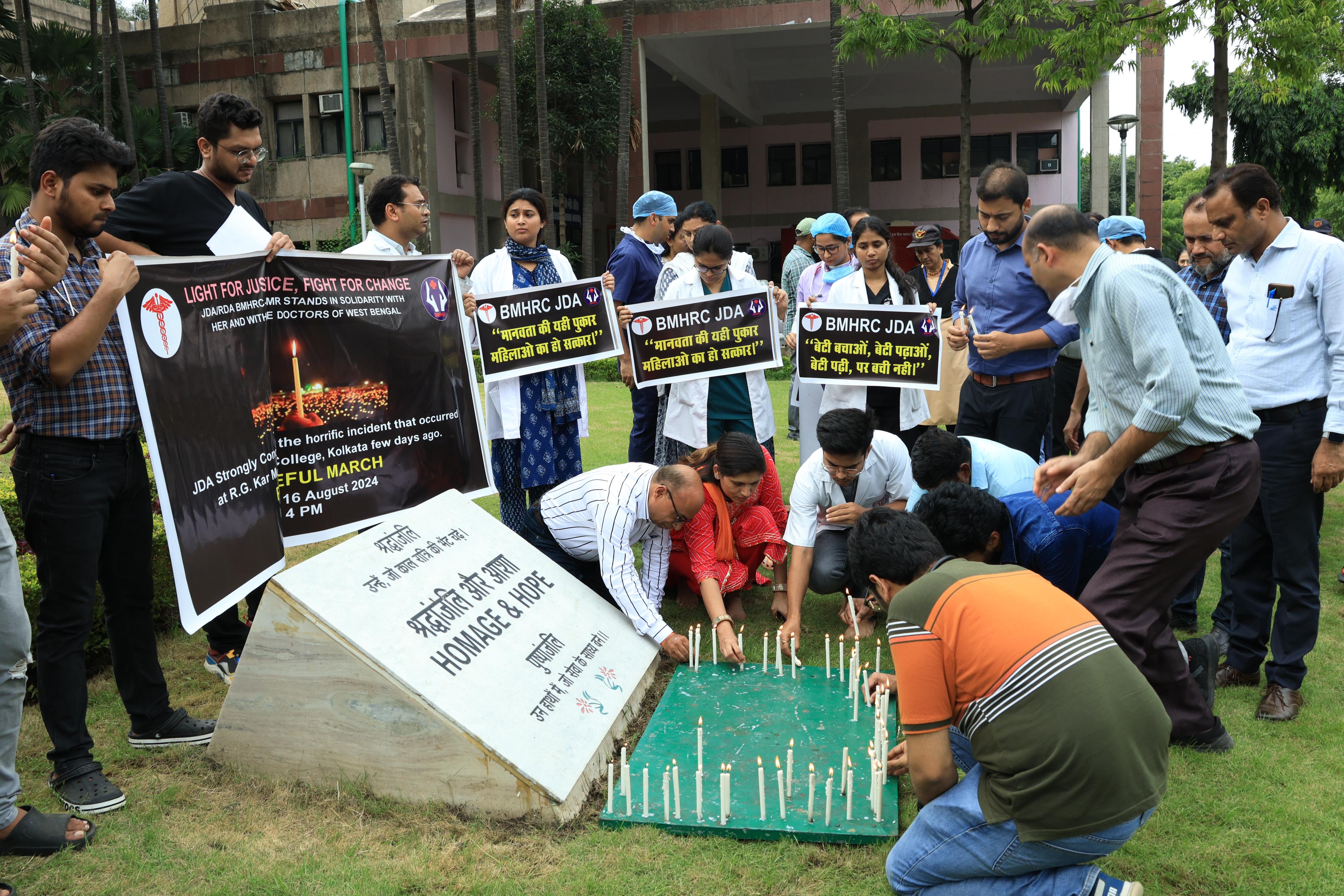 Tribute paid by lighting a candle for the peace of the soul of a medical student